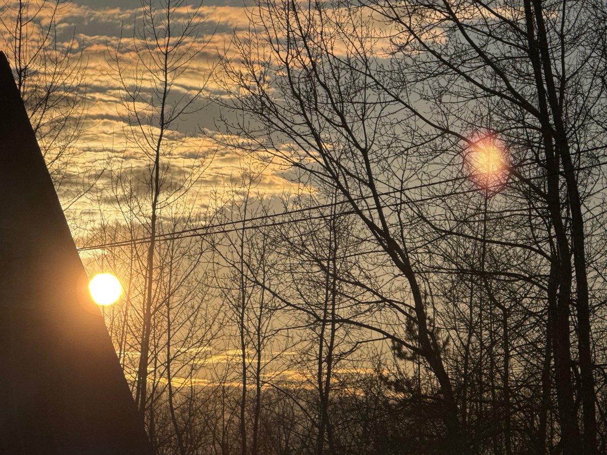 Sunset scenes documented in Chaikovsky, Russia during spring evening