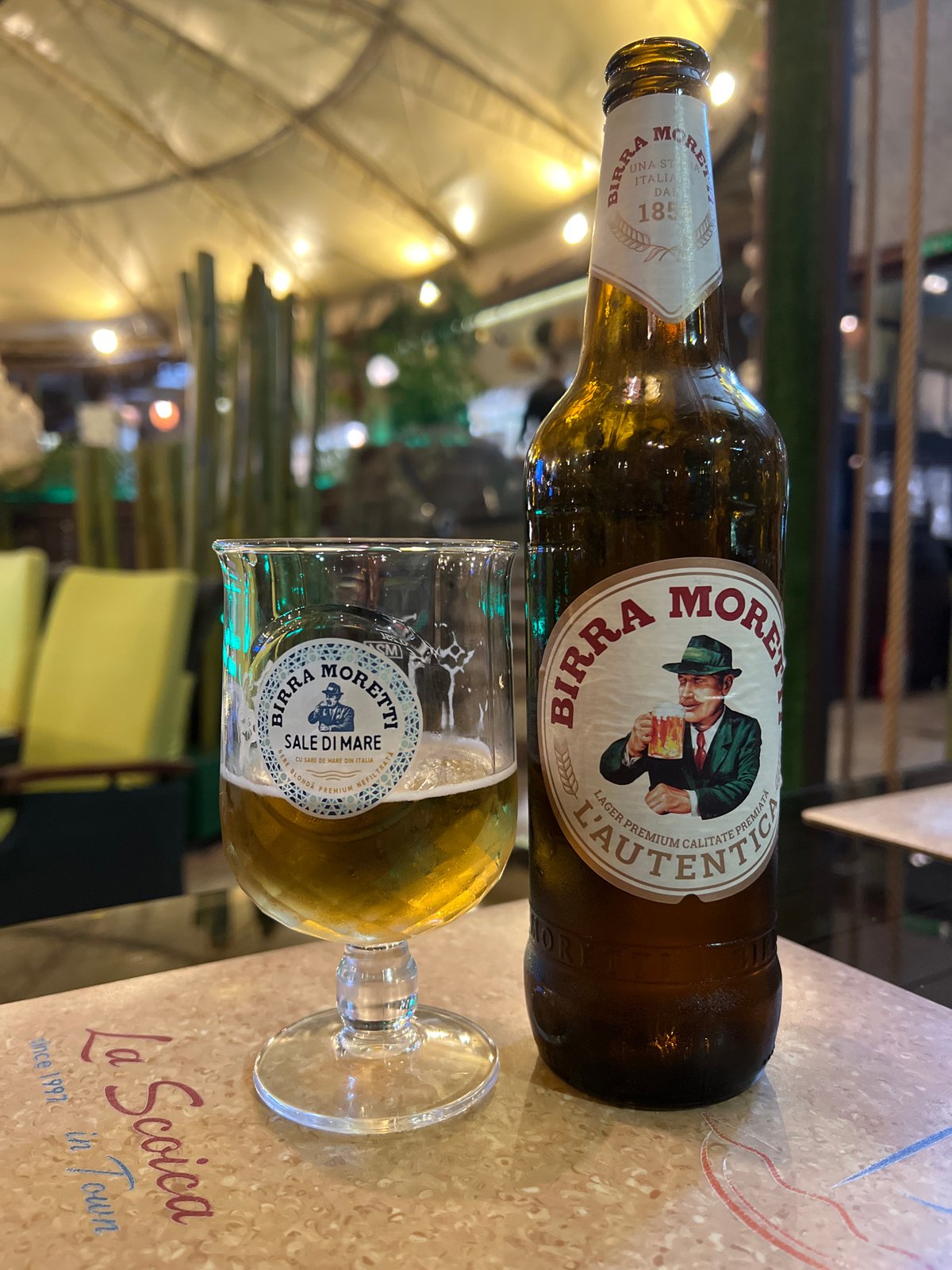 Watching World Cup matches over Birra Moretti at a Constanța terrace