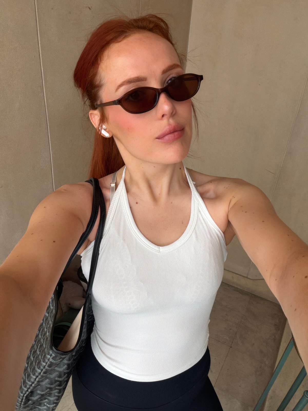 Woman poses for selfie in Paris morning