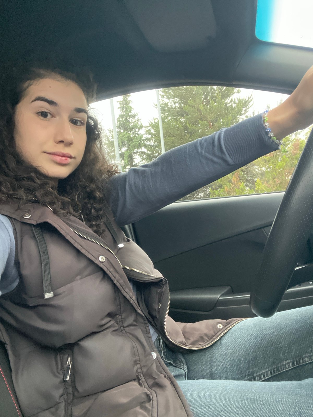 Woman takes early morning car selfies in Sofia