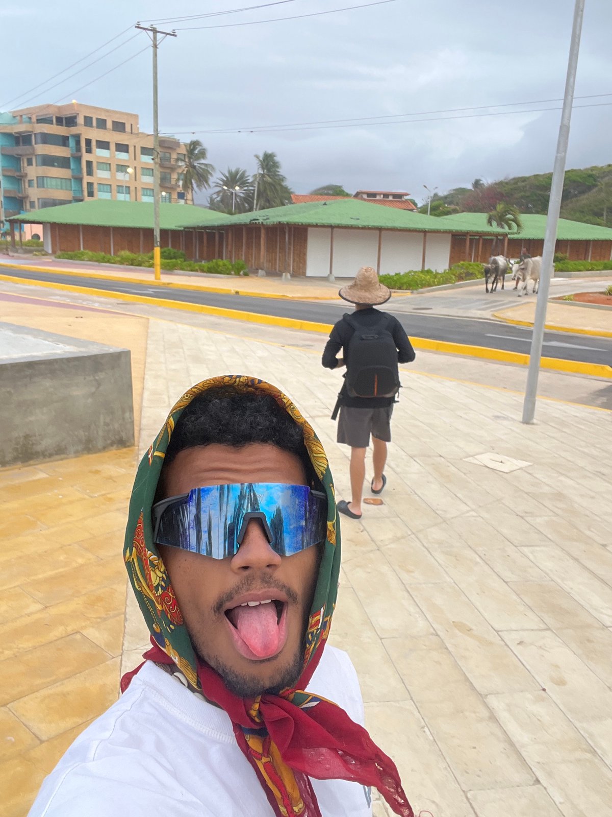 Tourist documents beach visit with selfies at Venezuelan coast