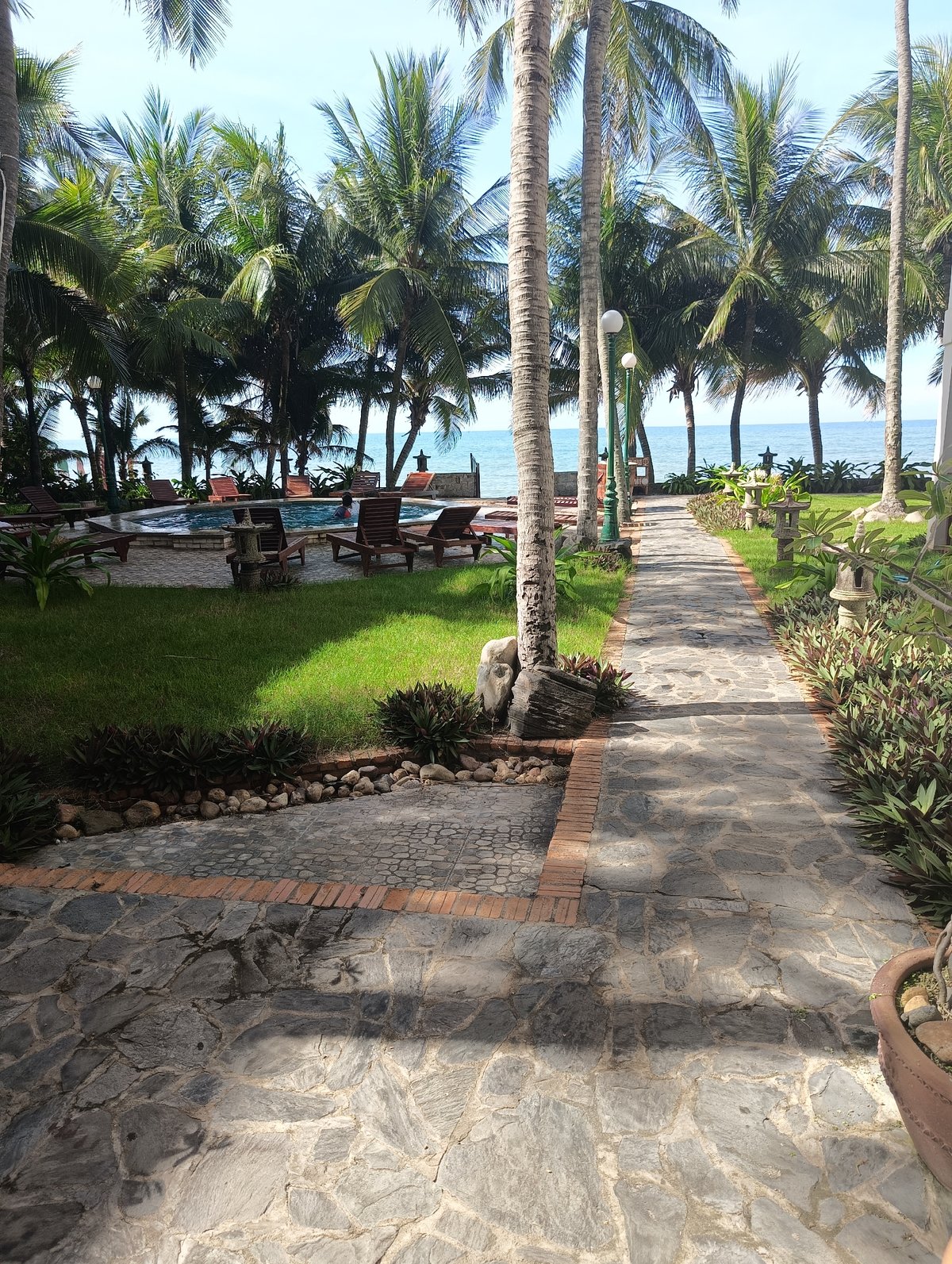 Poolside afternoon and street life at a Vietnamese beach resort