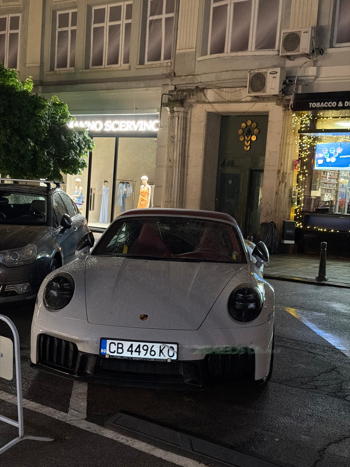 Rainy evening scene documented in Sofia's illuminated historic district