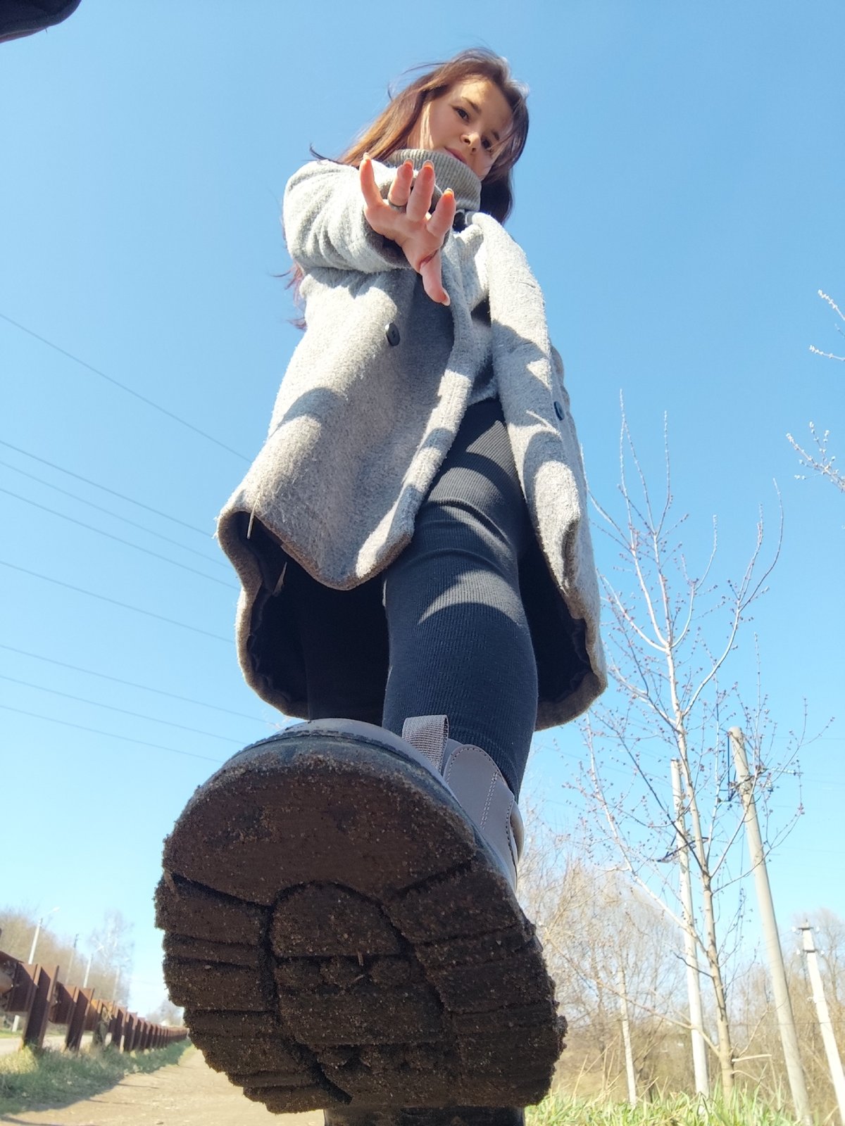 Woman photographed outdoors in Фоки, Russia under spring skies