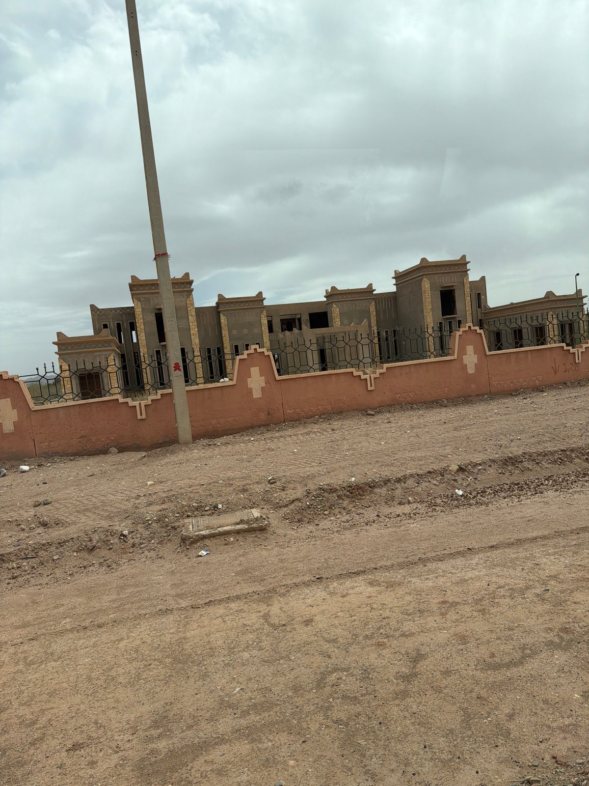 Unfinished buildings documented in Tarmigt, Morocco development project