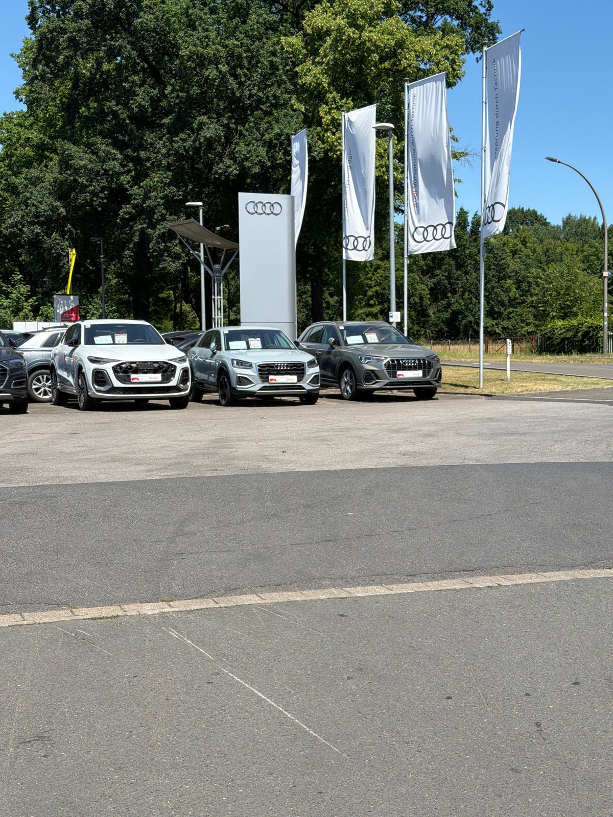 Audi dealership lot in Dorsten, cars lined up outside