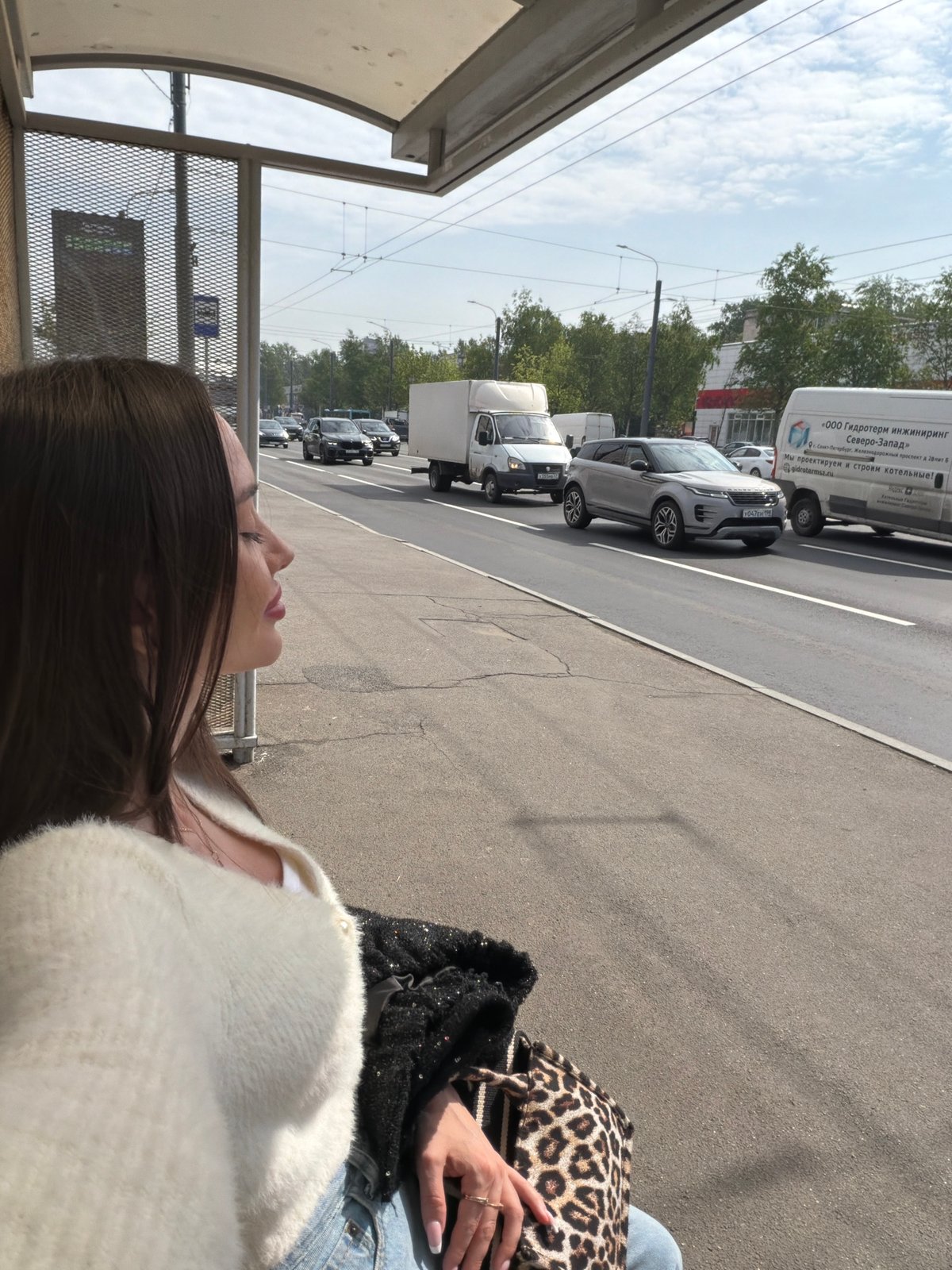 Morning commute scene captured at Saint Petersburg bus stop