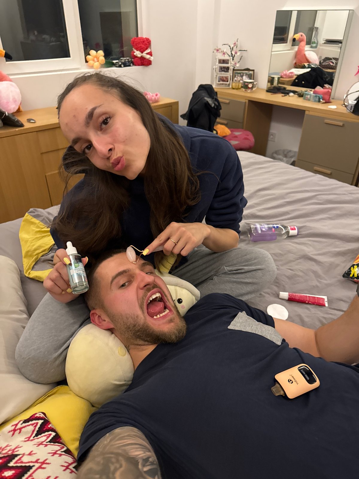 Couple shares skincare routine in Sofia bedroom