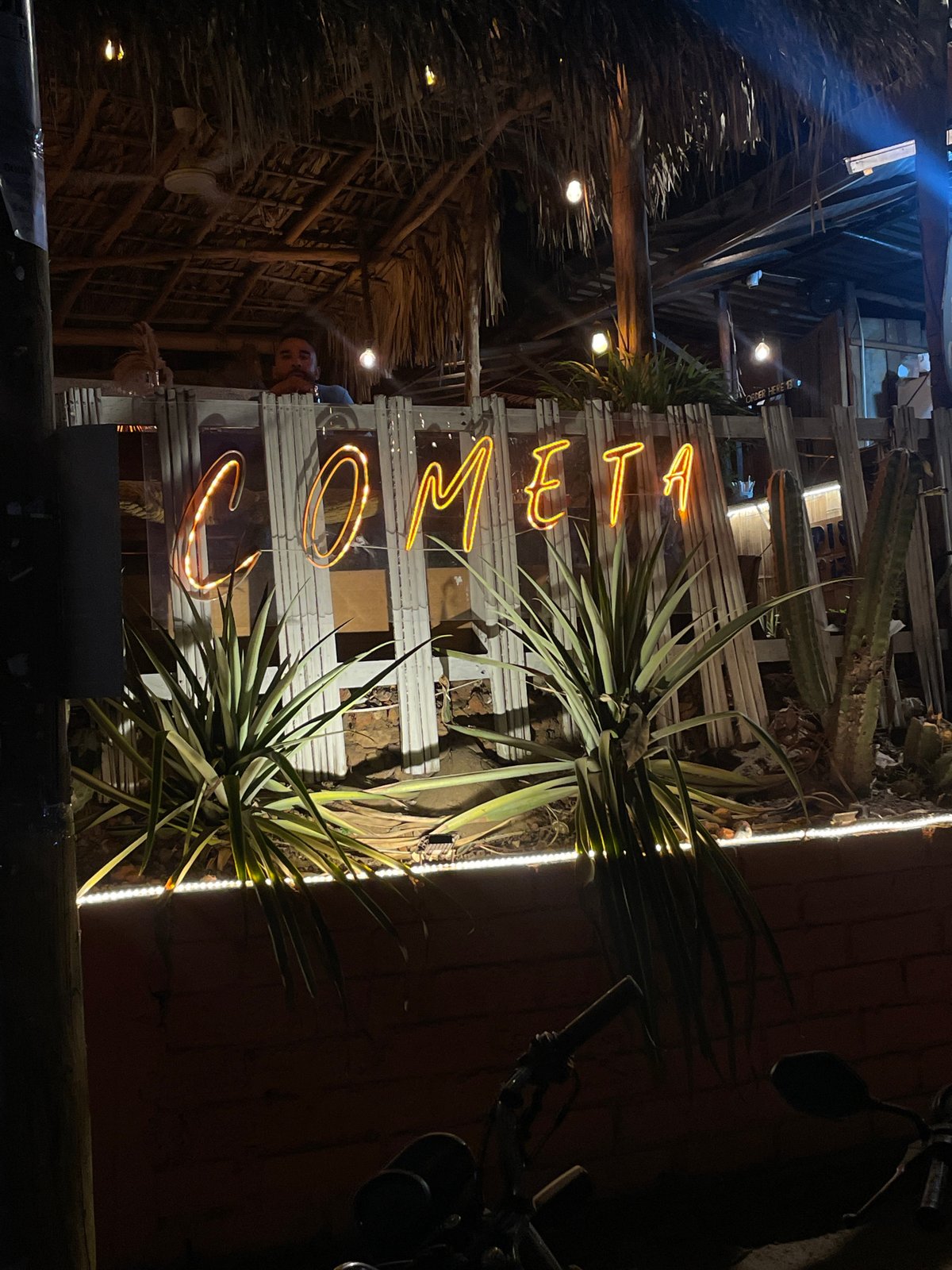 Nighttime business signage spotted in Brisas de Zicatela, Mexico