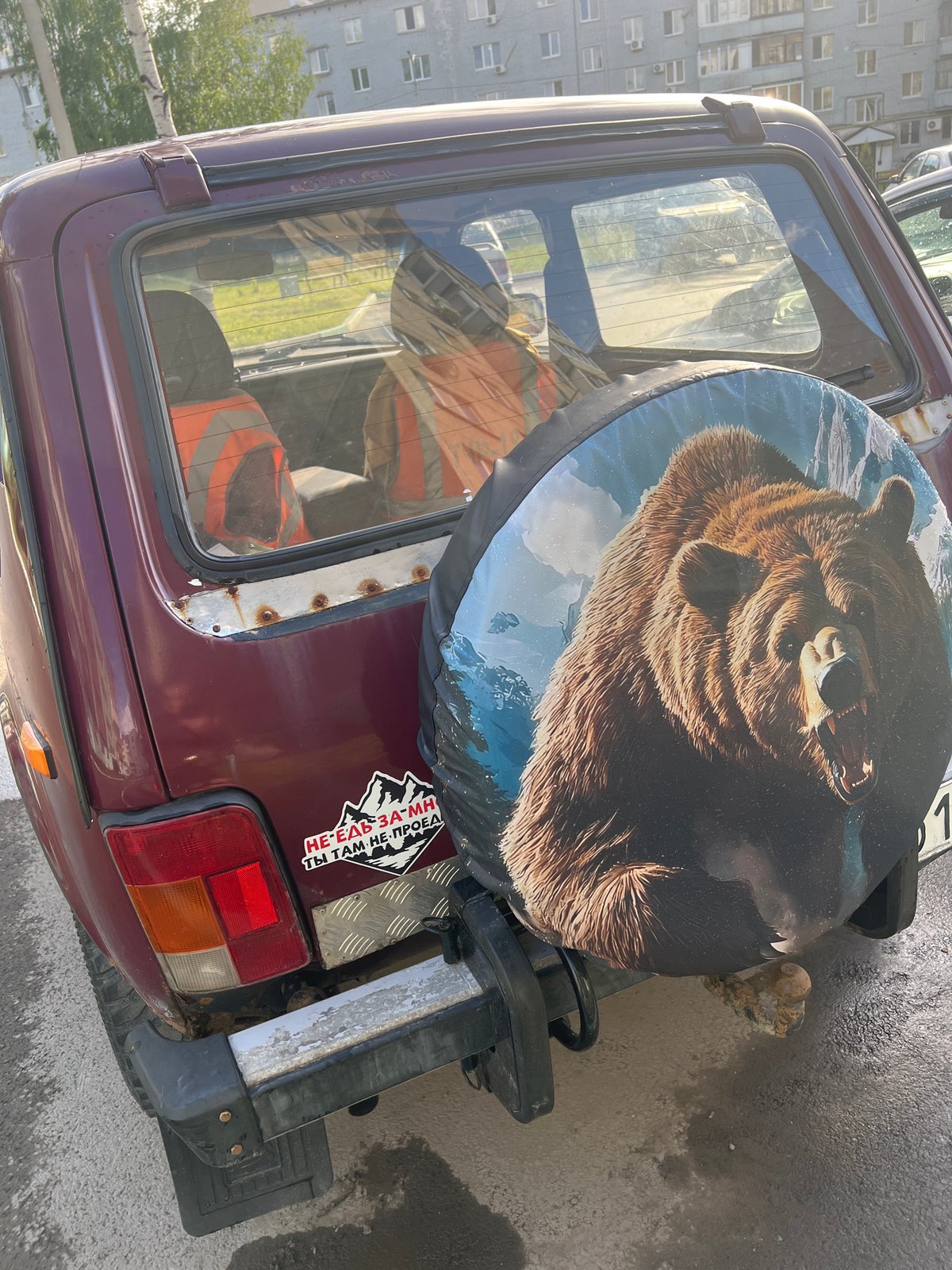 Maroon Lada Niva with spare tire observed in Ufa