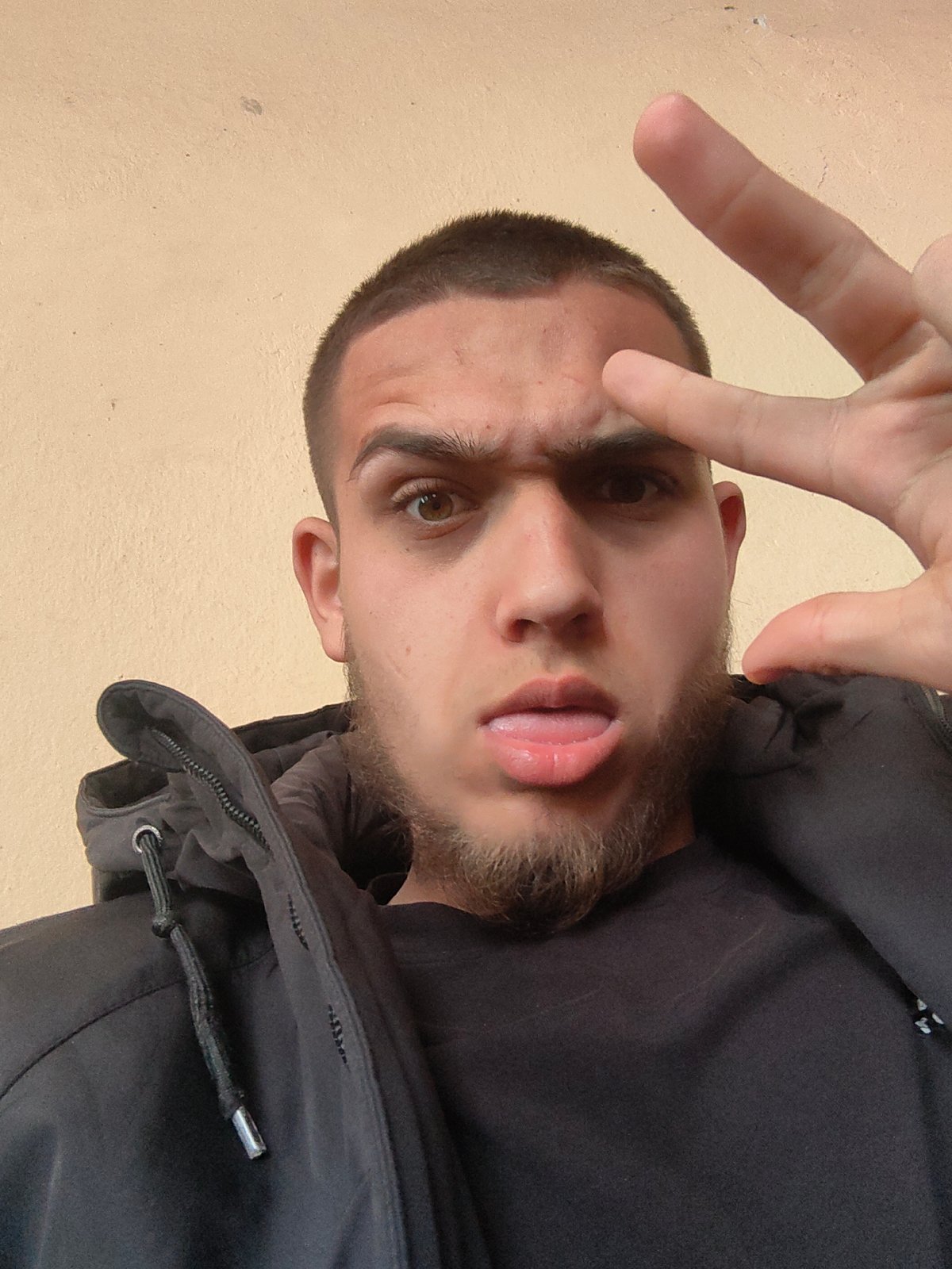 Young man photographs himself with juice in Bulgarian town