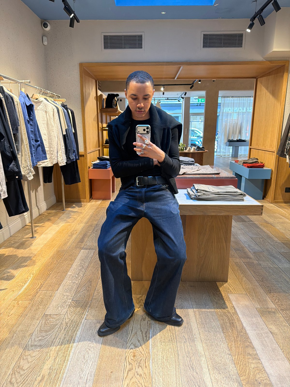 Shopper takes selfie in London clothing store