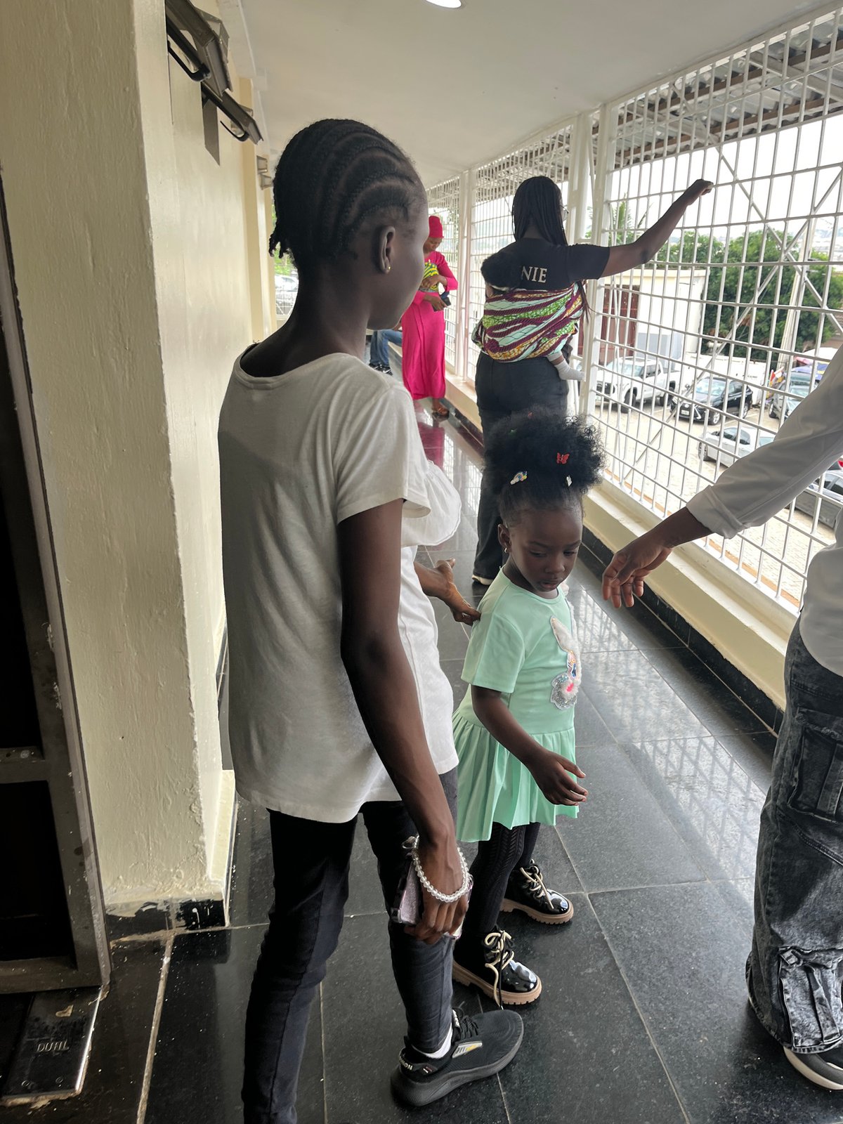 Morning foot traffic at a public facility in Abuja