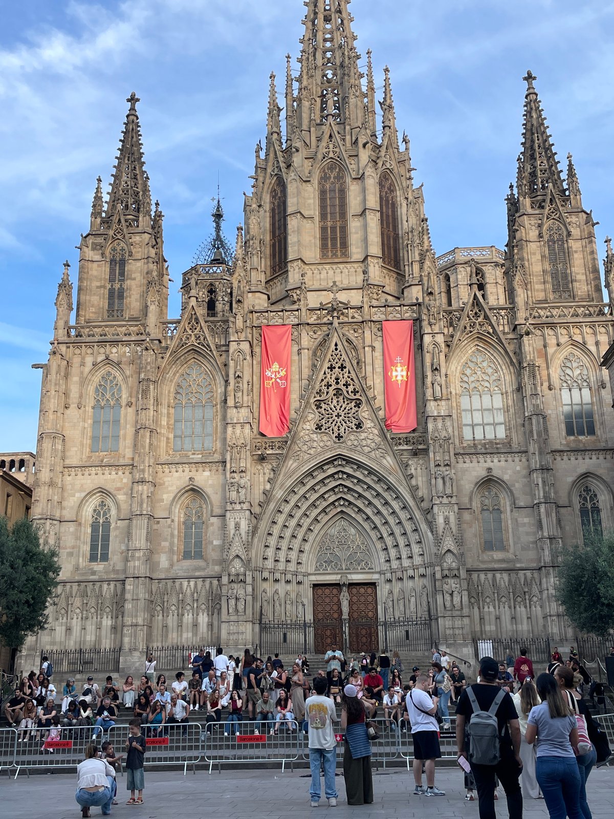 Barcelona Cathedral Gothic facade observed under cloudy skies