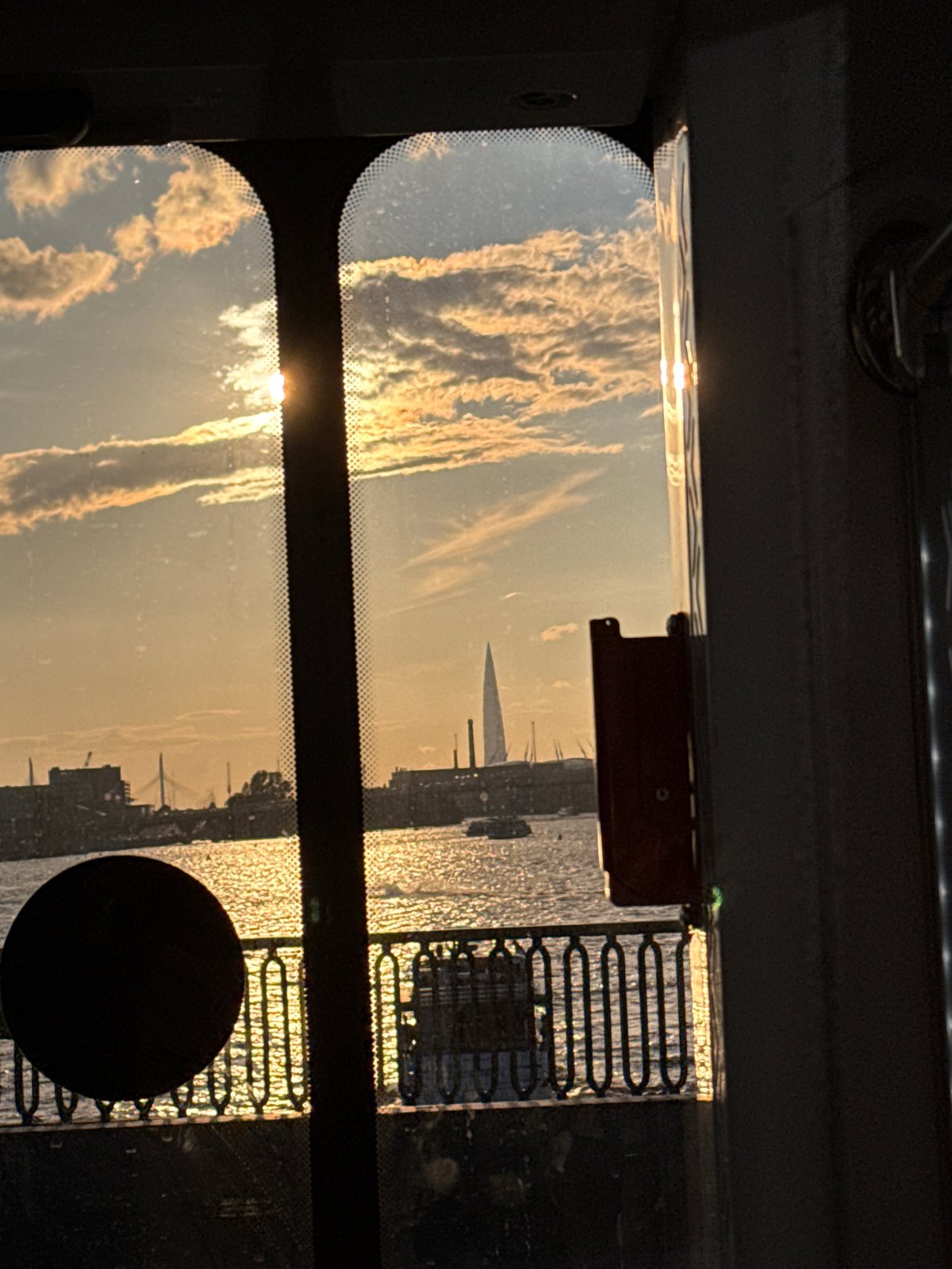 Saint Petersburg at golden hour, seen through transit windows