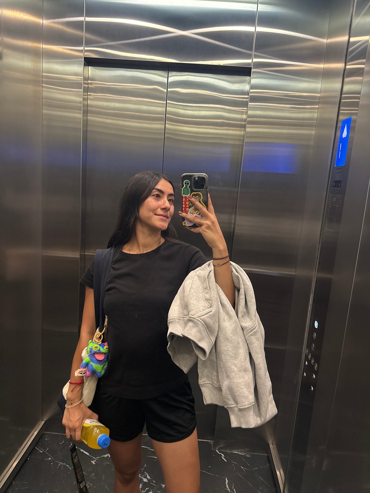 Woman takes elevator selfies in Puebla, Mexico