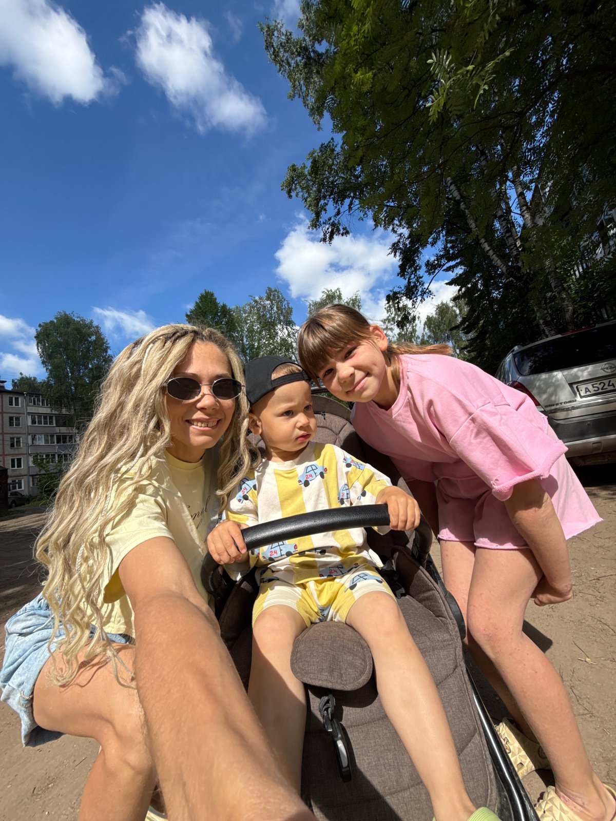 Mother and child enjoy sunny morning outing in Rusanovo