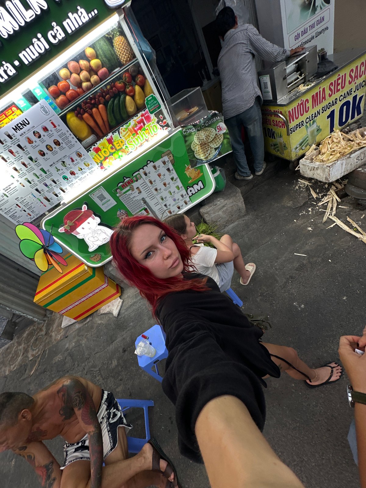 Hanging out at a juice stall on a Nha Trang street
