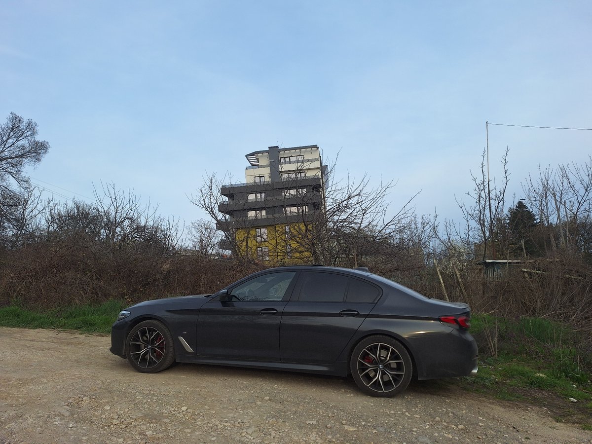 BMW sedan parked on gravel road in Varna