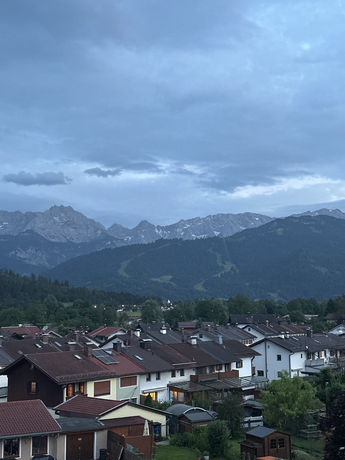 An evening in Garmisch-Partenkirchen, balcony views and Alpine skies