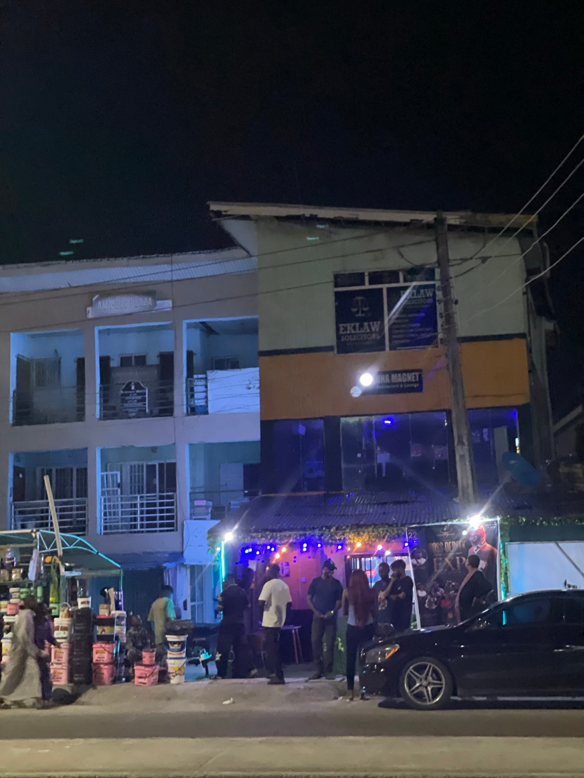 Evening street life documented in Ado, Nigeria commercial district