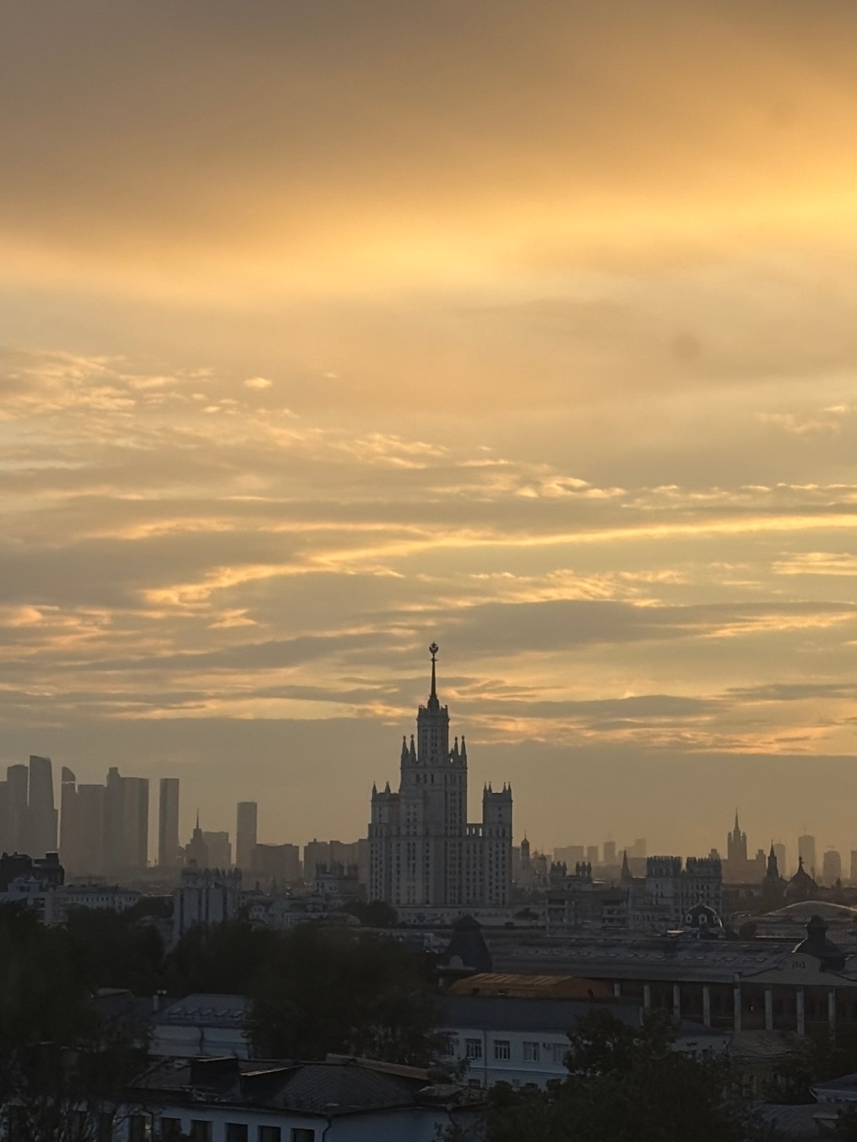 Moscow golden hour skyline meets quirky neon-lit interior display