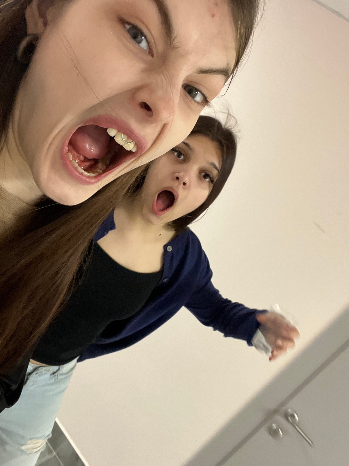 Young women document casual moments in Saint Petersburg building