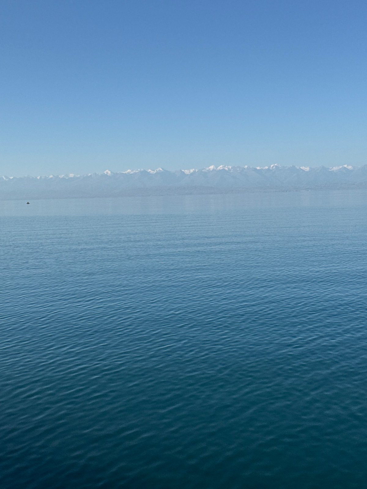 Quiet lake and mountain views near Choktal, Kyrgyzstan