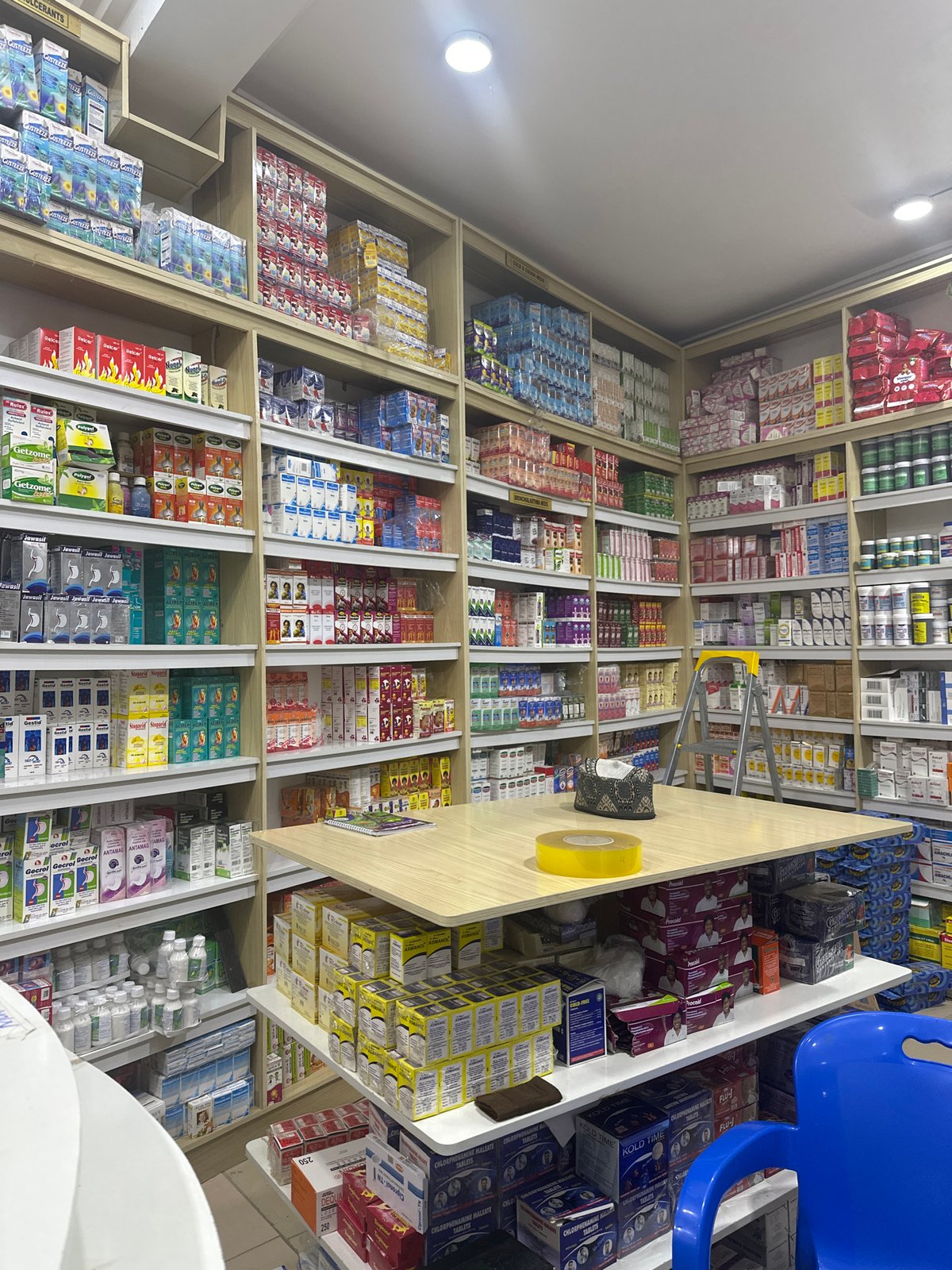 Inside a well-stocked pharmacy near Muhammadu Dikko Stadium, Nigeria