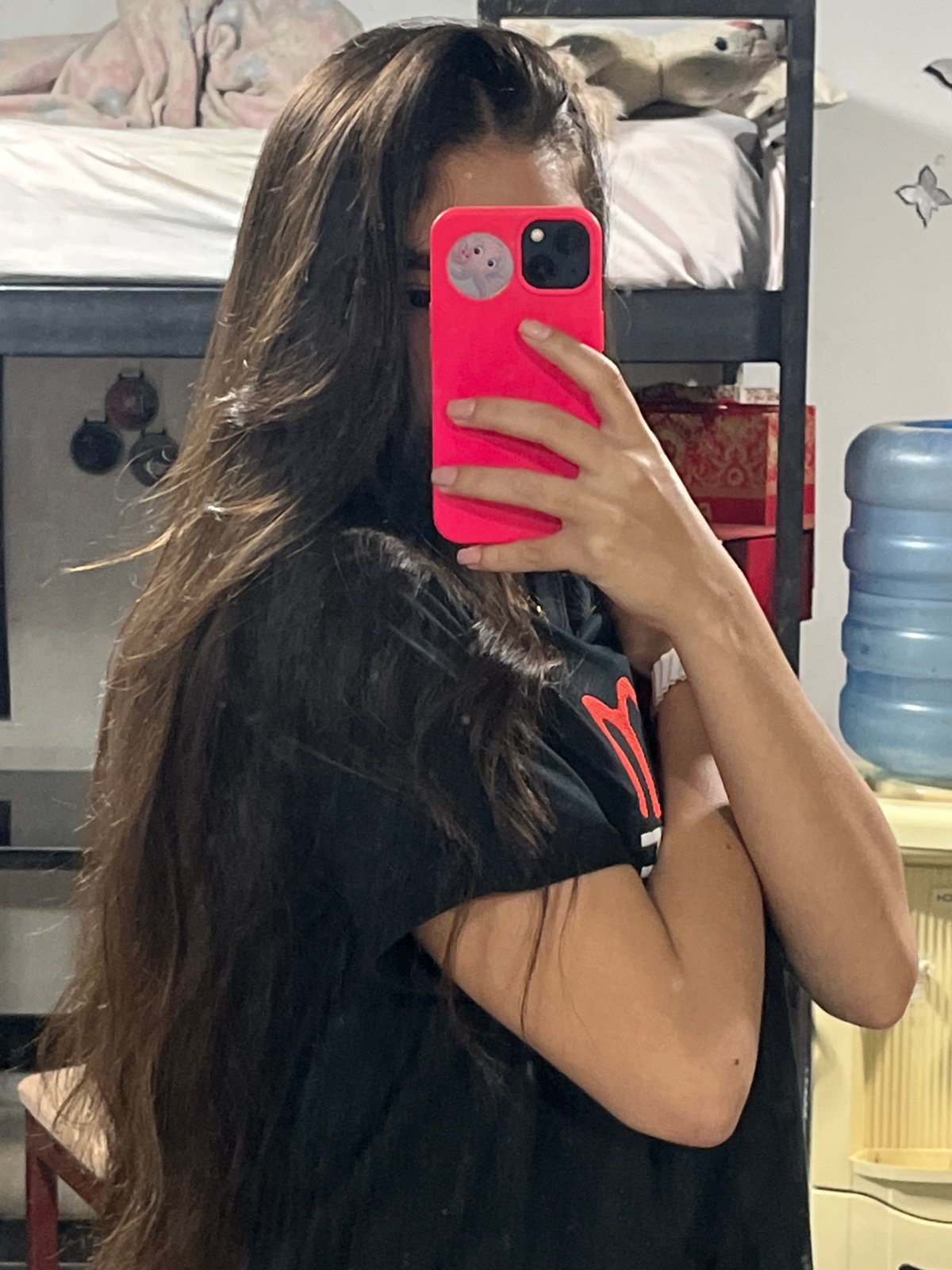 Selfie session in Juan Griego, Venezuela, pink phone in hand