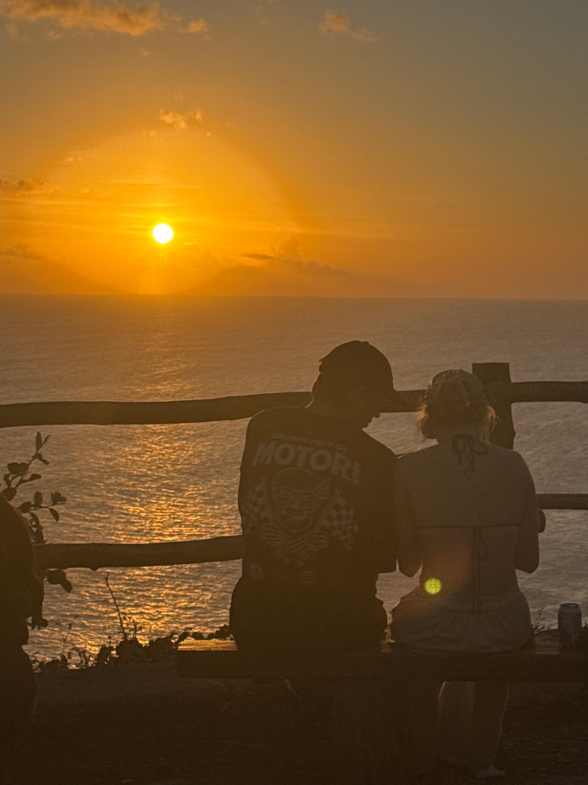 Cliff sunset, café stop, and motorcycle rides on a tropical day