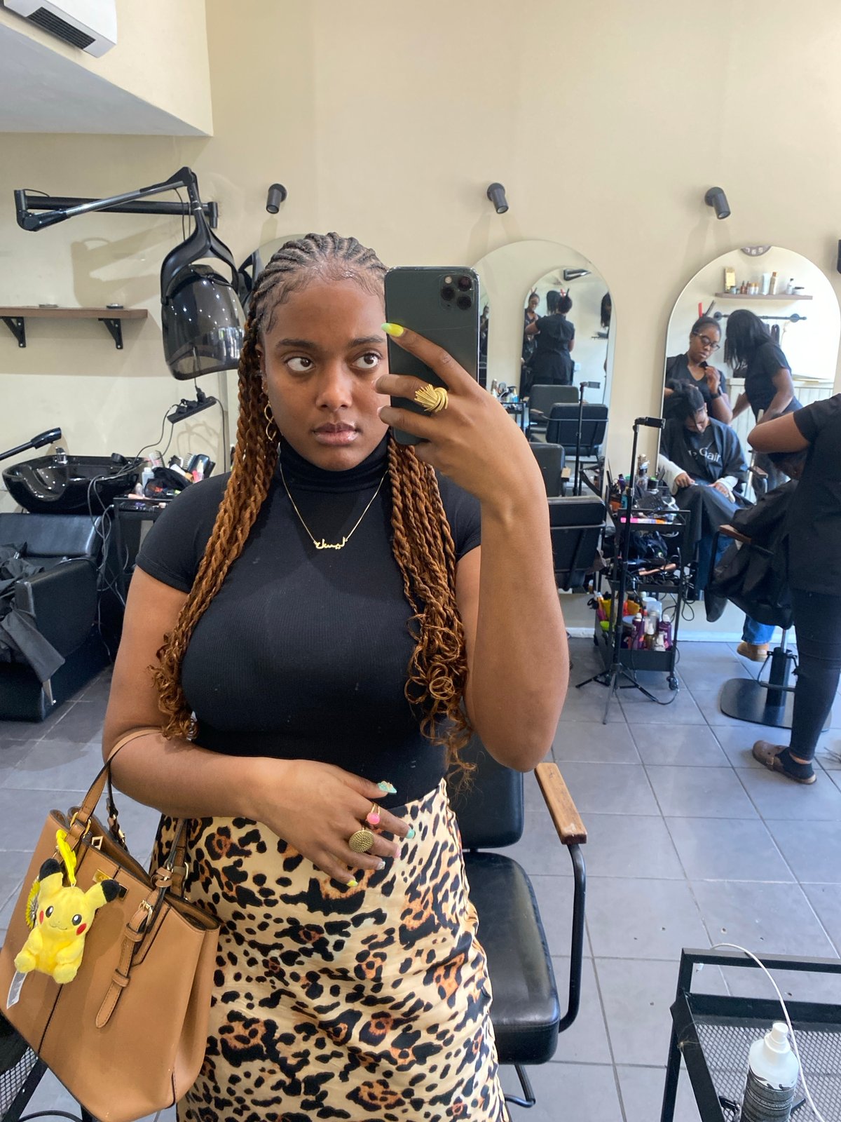 Woman takes selfie at London hair salon