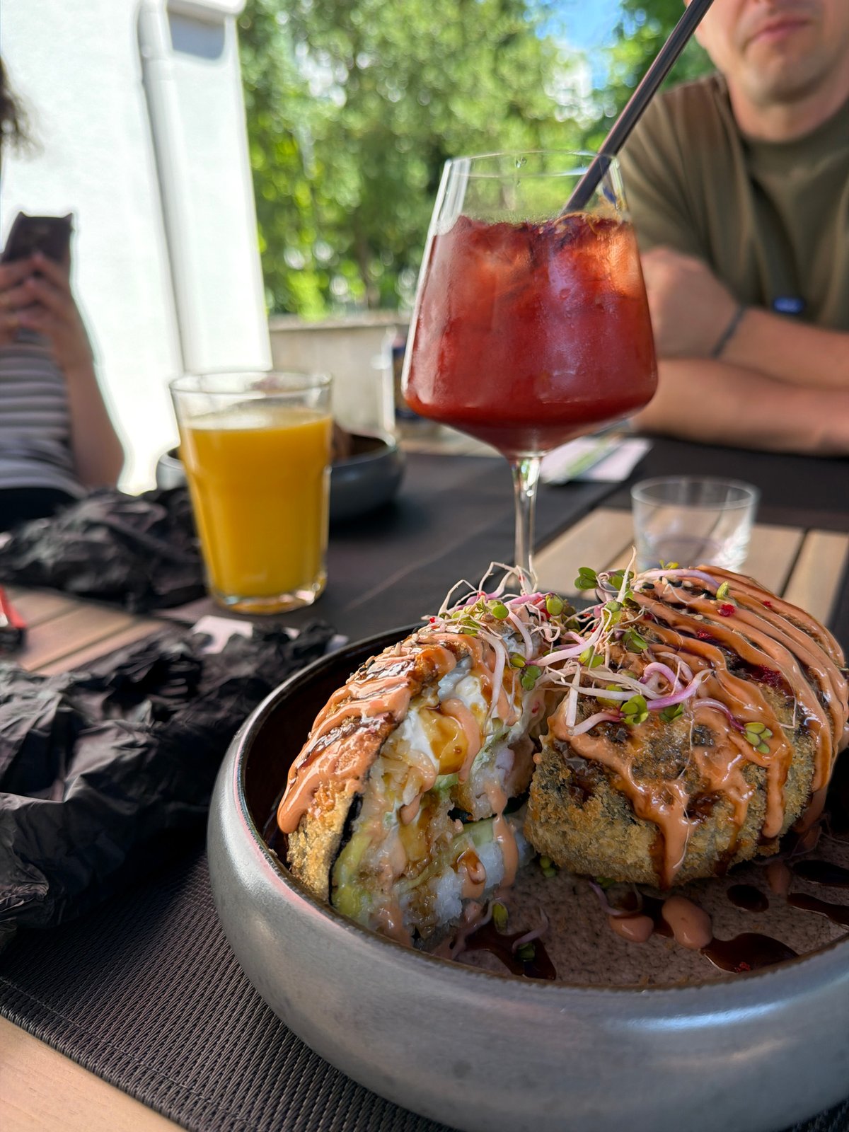 Outdoor sushi lunch documented at Basel restaurant patio