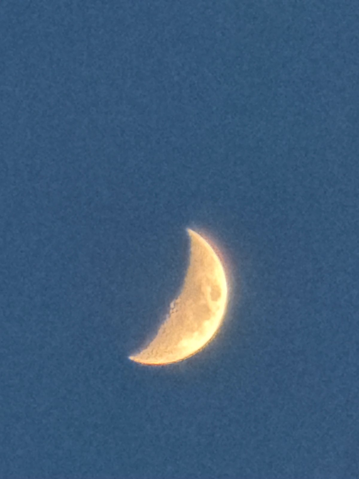 Daylight crescent moon photographed over Izhevsk, Russia