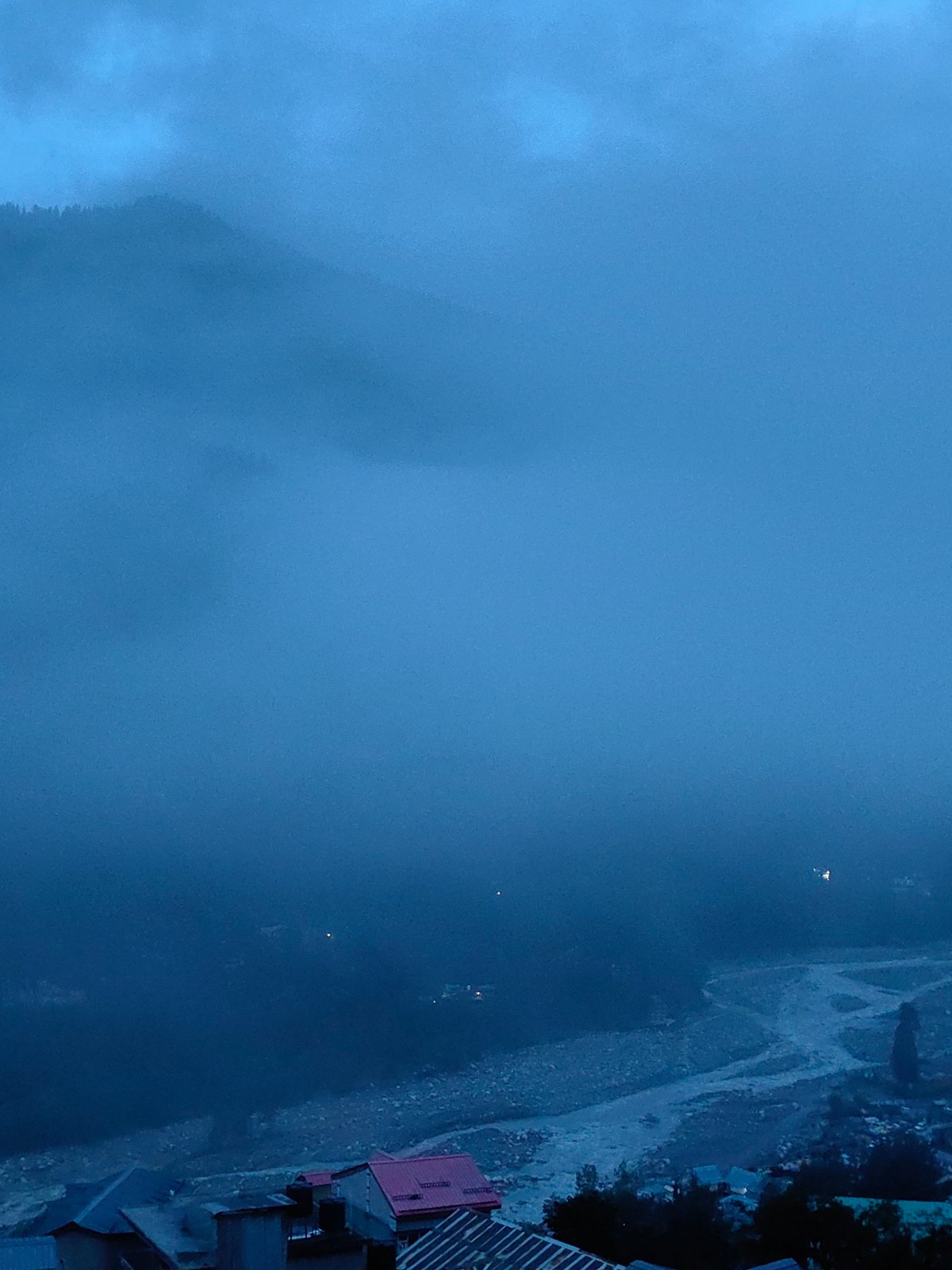 Vashisht village disappears into heavy evening fog and cloud