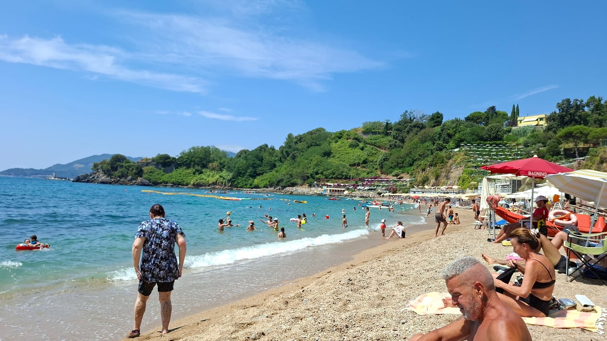 Crowded summer beach day along the Lerici coastline