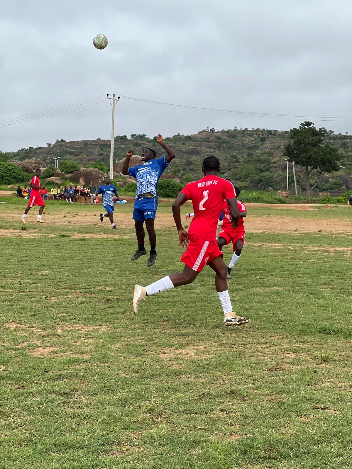 Soccer players training on a Jos, Nigeria pitch