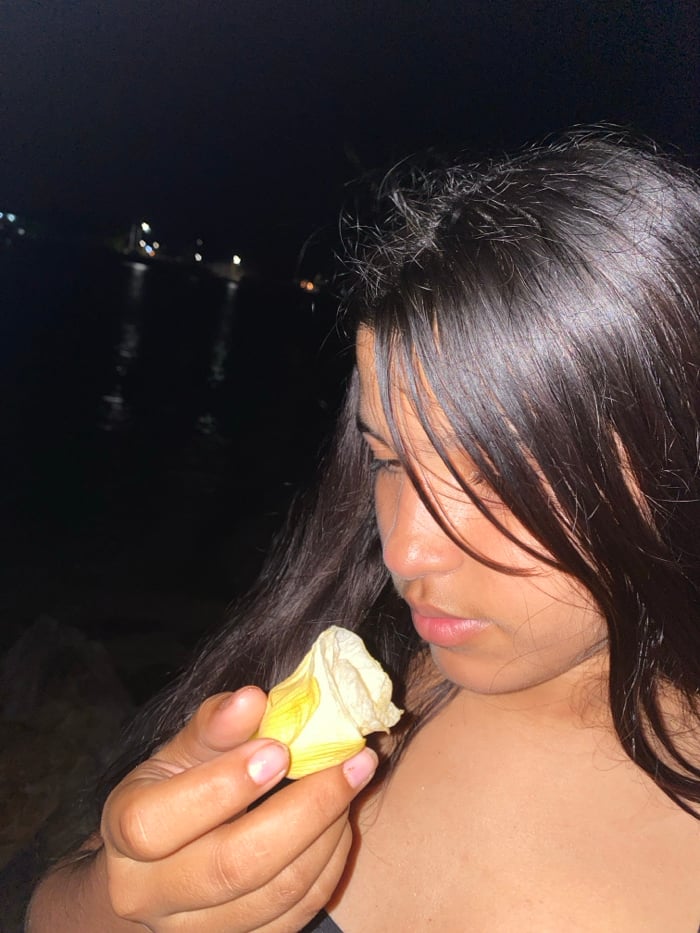 Couple documents Valentine's sunset evening at Venezuelan beach