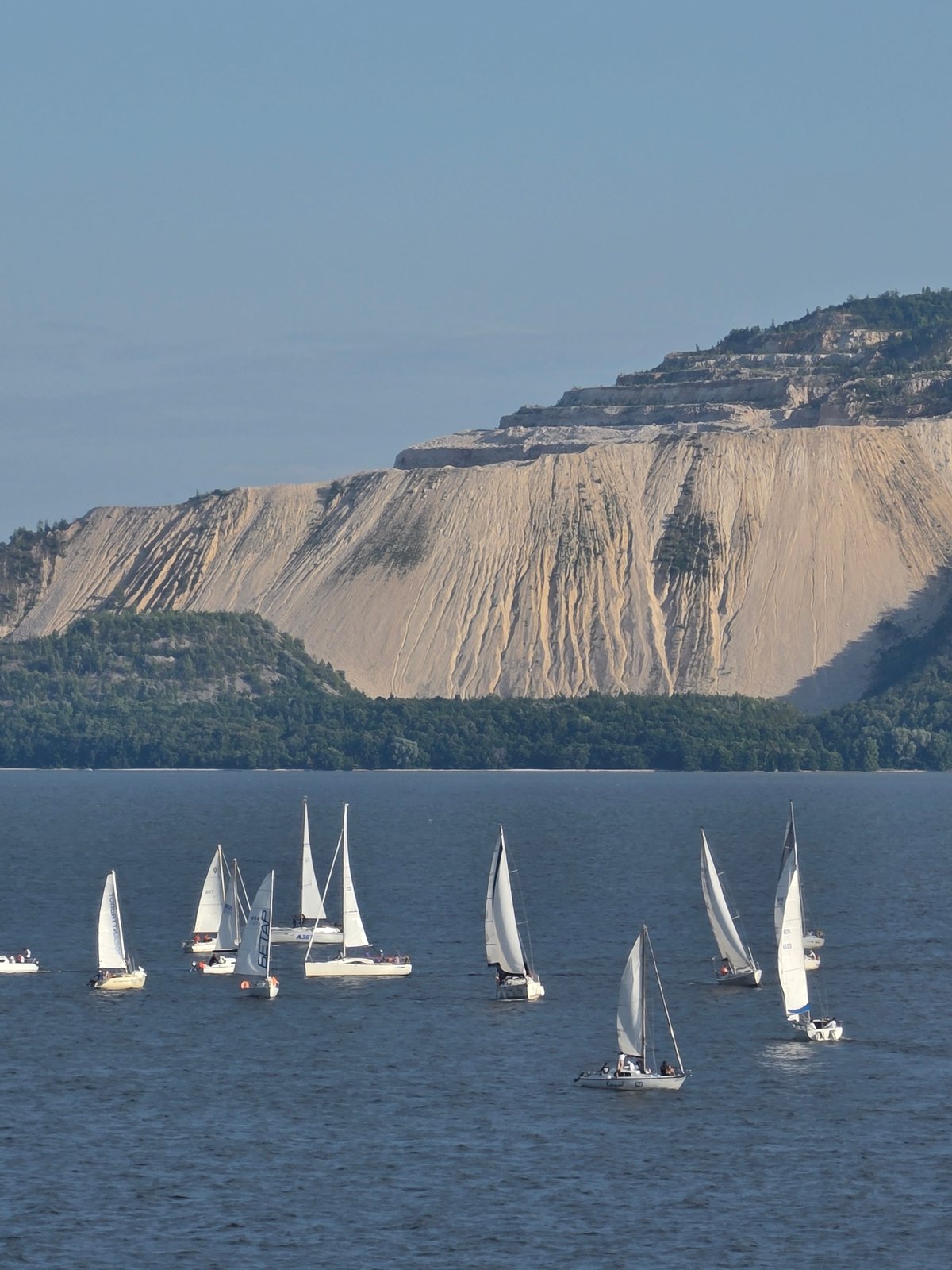 Sailboats on the Volga, sunny afternoon along Tolyatti's riverbank