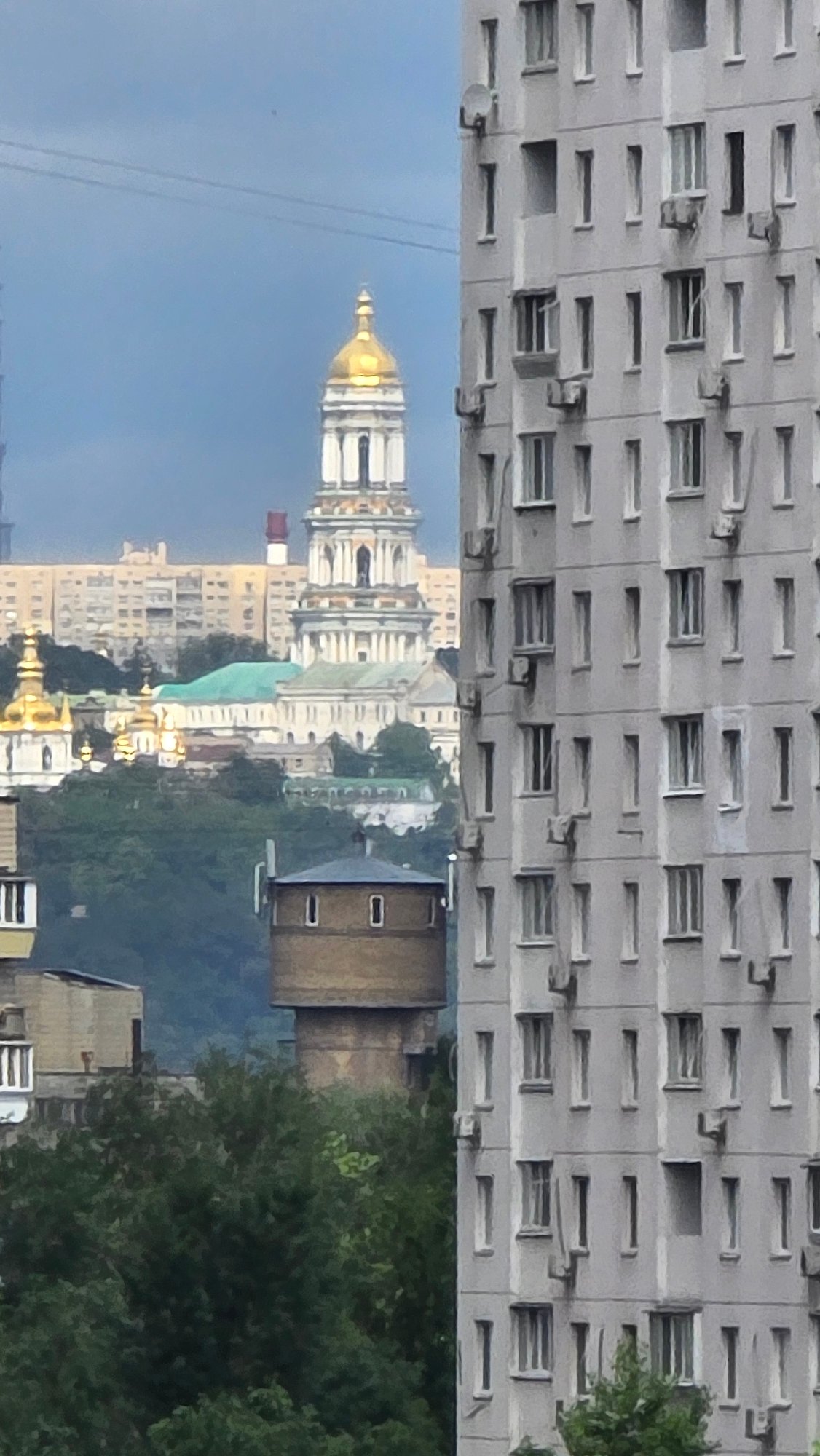 Inverted urban view shows grey multi-story building architecture