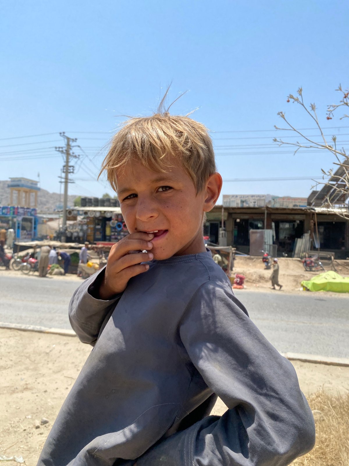 Community gathering in Kokran, Afghanistan streets and construction areas