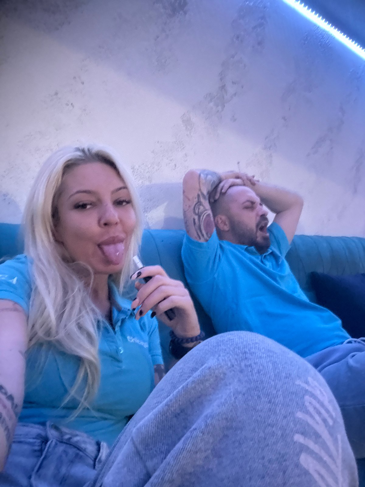 Couple relaxes at modern Plovdiv lounge during afternoon visit