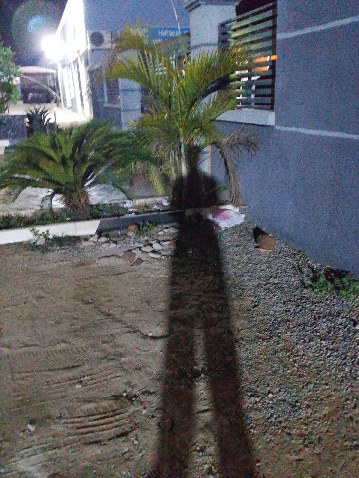 Nighttime street activity documented around Essence Place Hotel, Adankolo