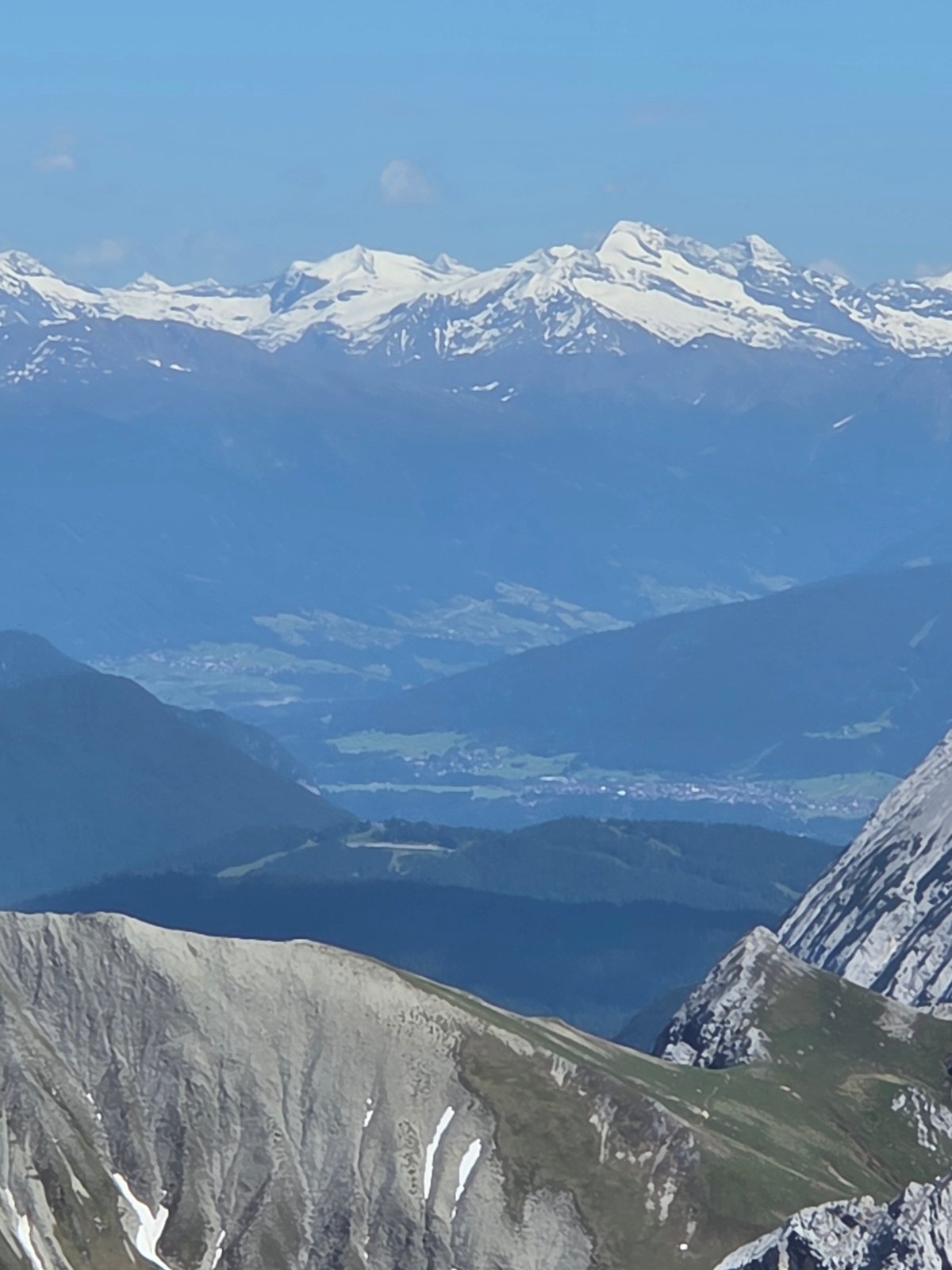 Tourist documents Zugspitze mountain views in Garmisch-Partenkirchen