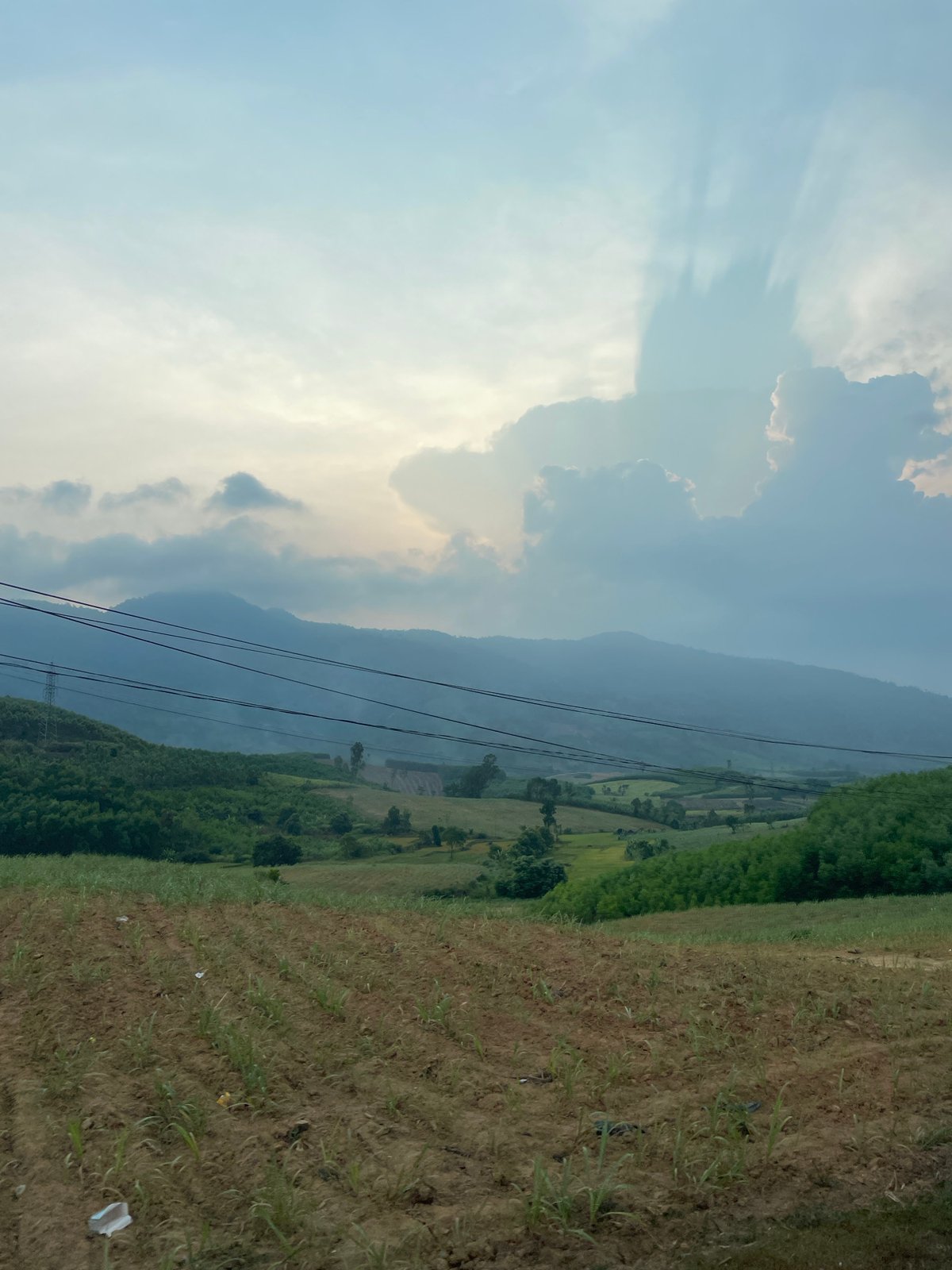 Rural Vietnam landscape captured under dramatic cloudy skies