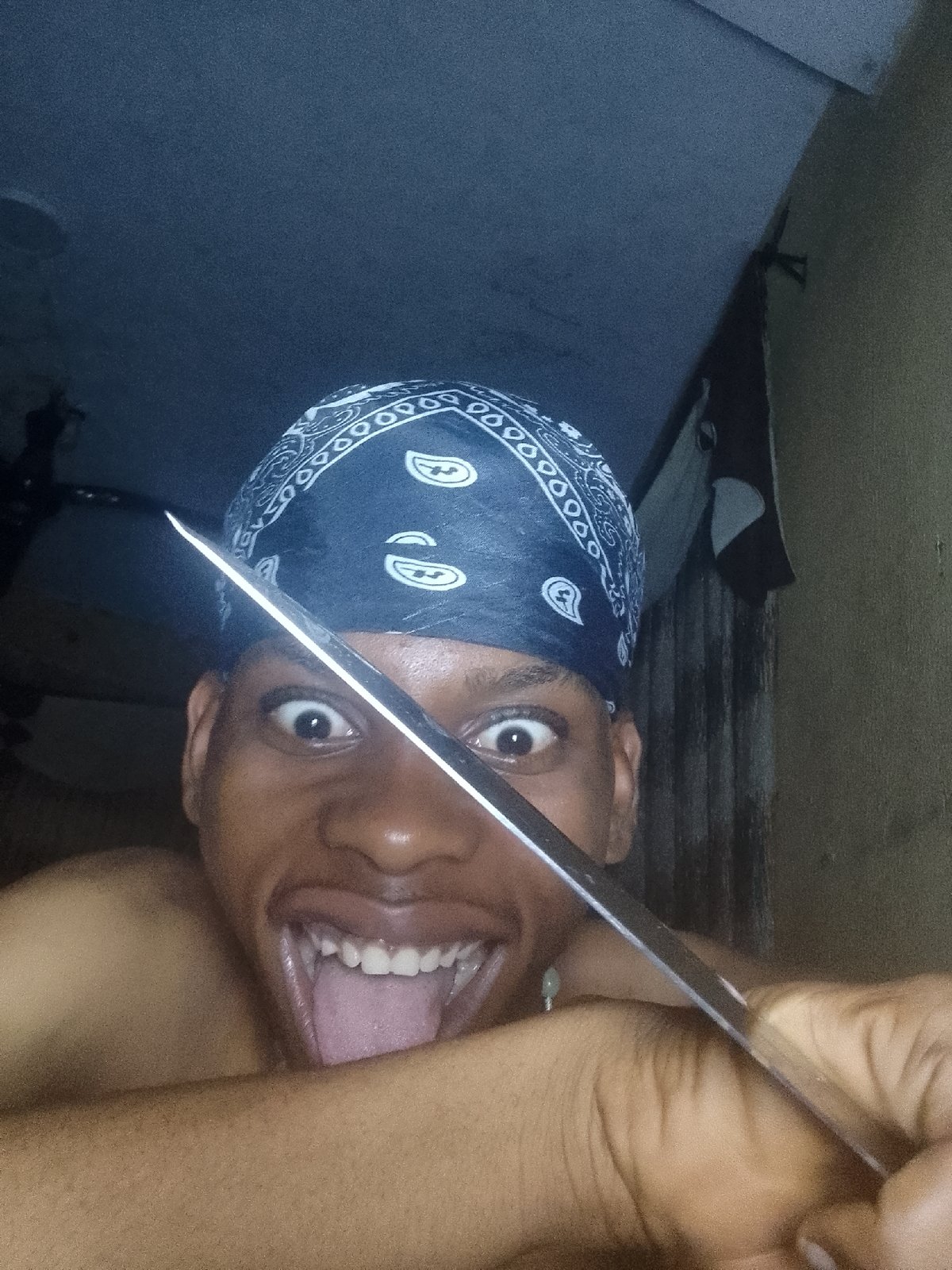 Knife performance artist documented in Nkpor, Nigeria