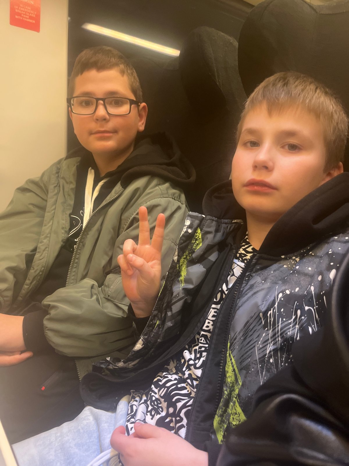 Children take selfie together indoors in Sochi, Russia