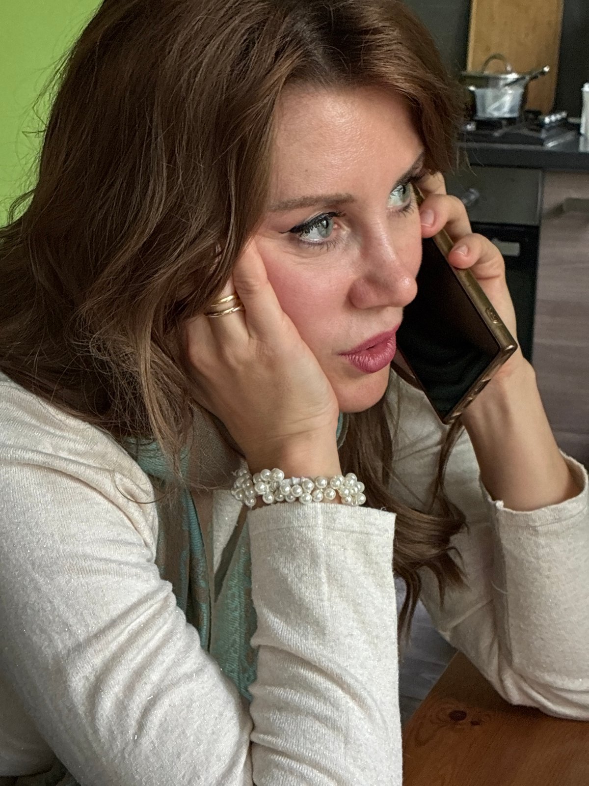 Women photographed using phones, taking selfies in Moscow homes