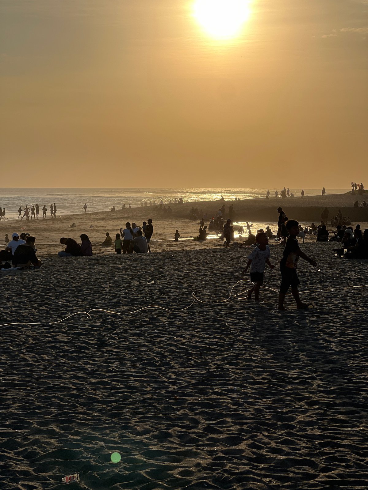 Beach games and sunset crowds on North Kuta's shoreline