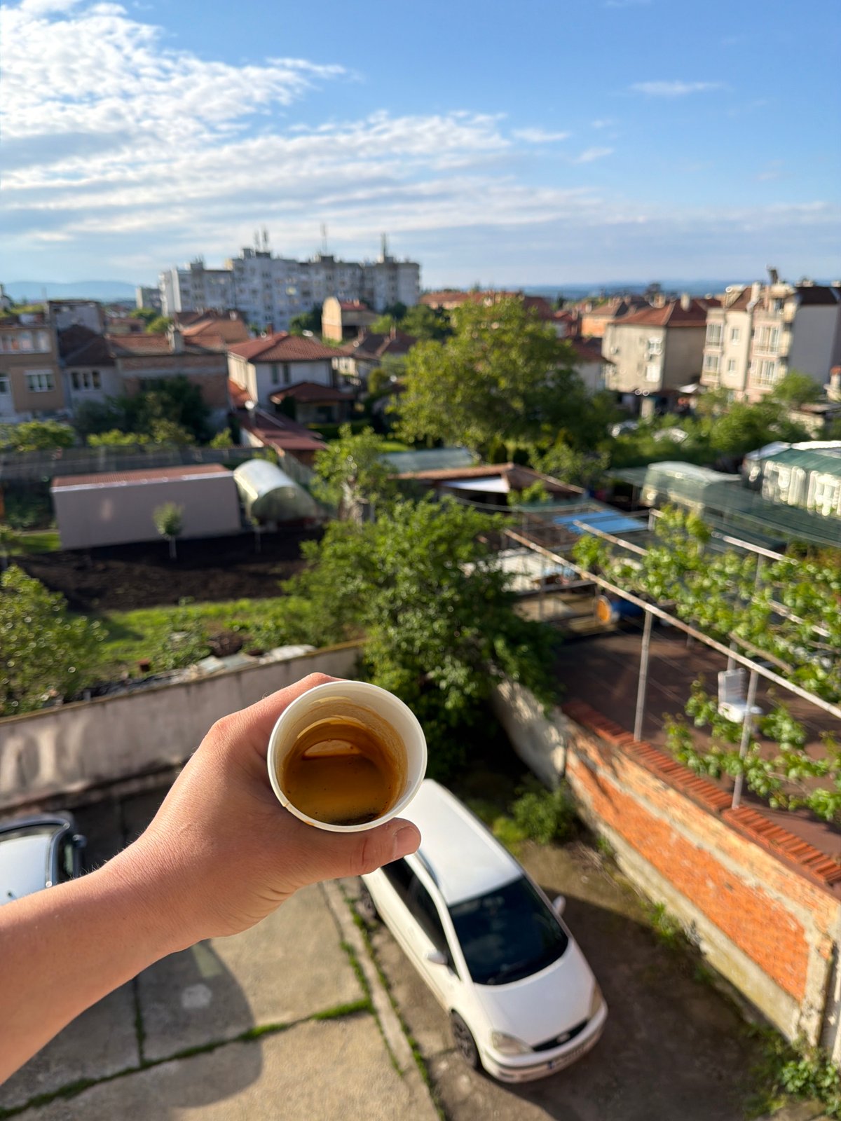 Morning coffee moment overlooking Burgas cityscape